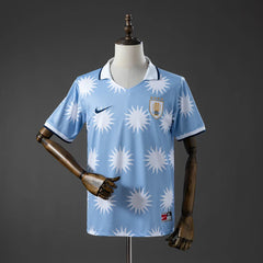 Camiseta especial de Uruguay 26/27 celeste con soles blancos - vista frontal