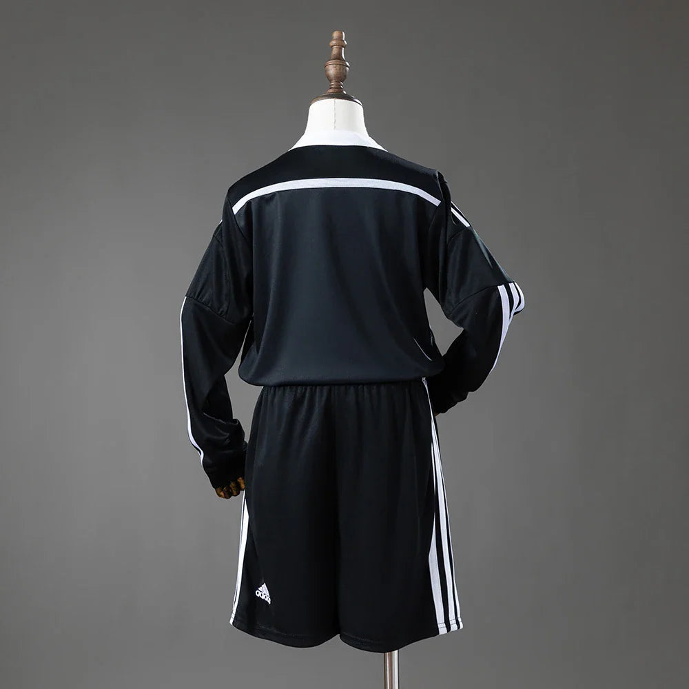 Conjunto infantil de manga larga del Real Madrid tercera equipación 14/15 con la espalda lisa - vista trasera