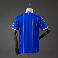 Camiseta del Rangers primera equipación 26/27 azul con rayas blancas - vista trasera