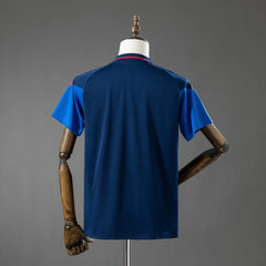 Polo de entrenamiento de Colombia 2026 con la espalda azul lisa - vista trasera