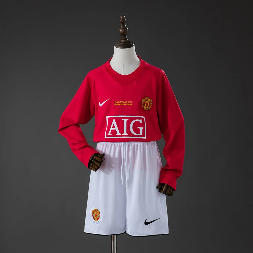 Conjunto retro del Manchester United 07/08 para niños con camiseta roja de manga larga - vista frontal