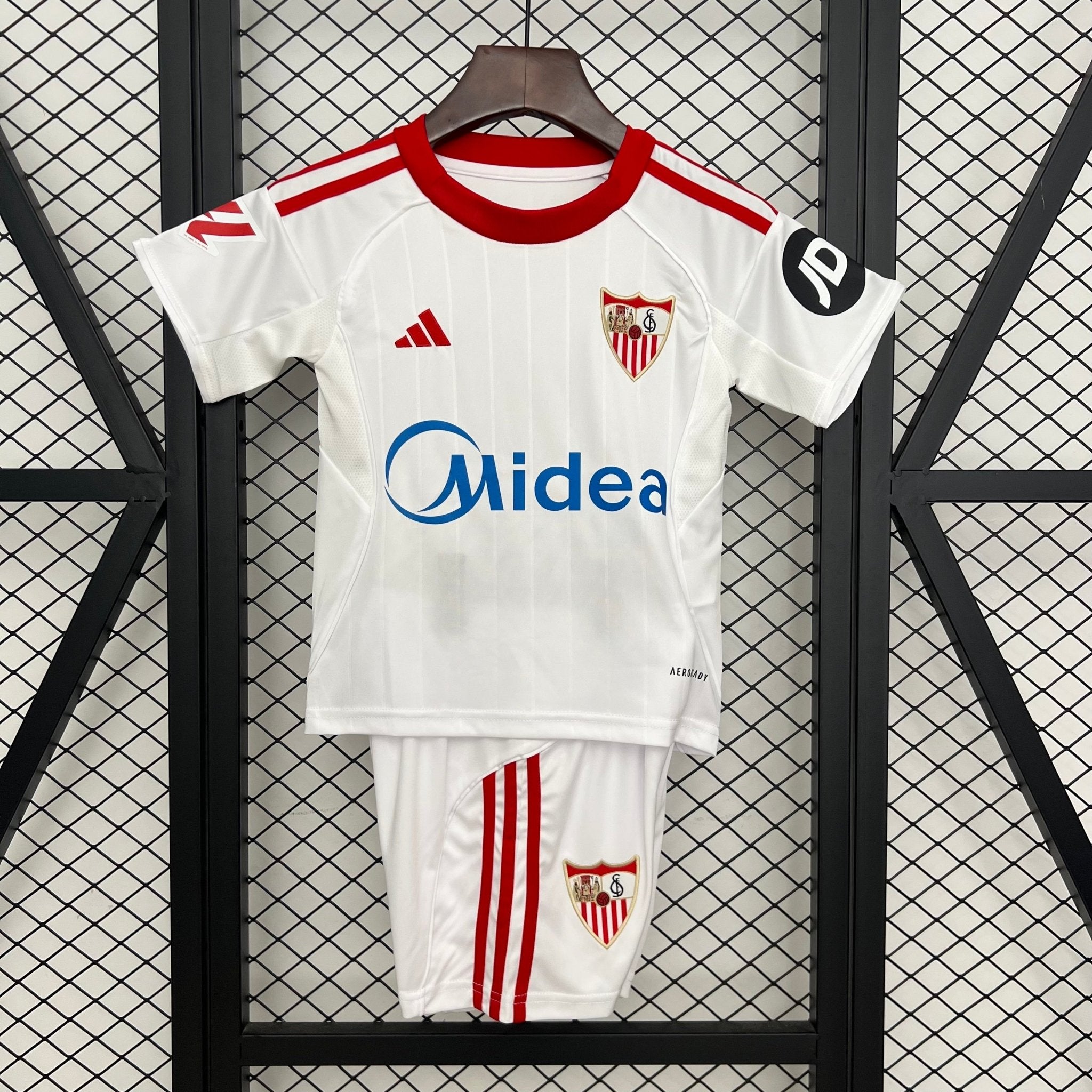 SEVILLA PRIMERA EQUIPACIÓN 25/26 NIÑOS - Bota de Oro Tienda