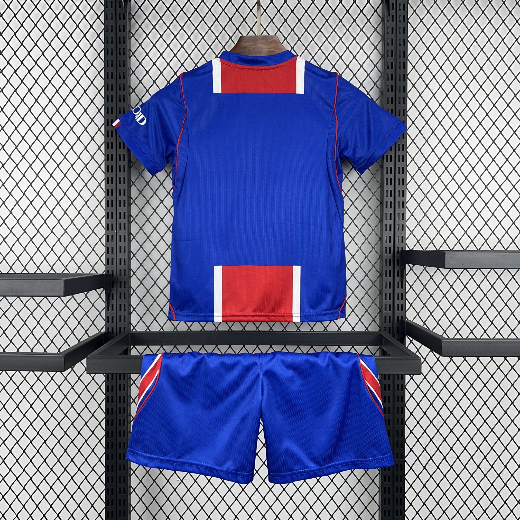 Conjunto infantil azul del Paris Saint-Germain primera equipación 26/27 - vista trasera