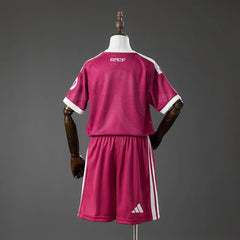 Conjunto Real Madrid tercera equipación 26/27 niños rosa - vista trasera