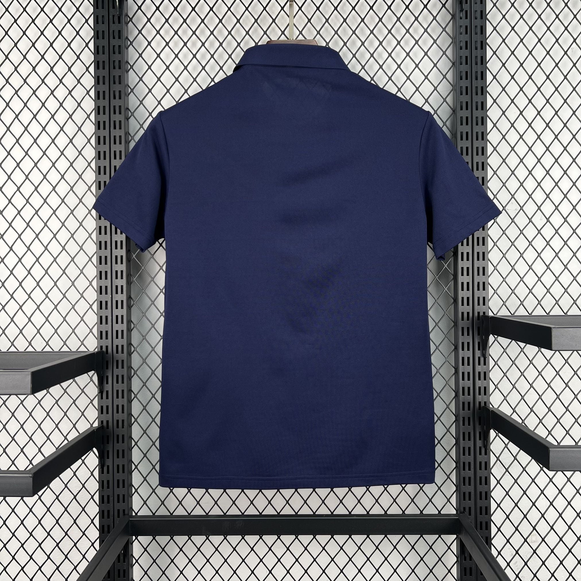 Polo España 2026 azul marino - vista trasera