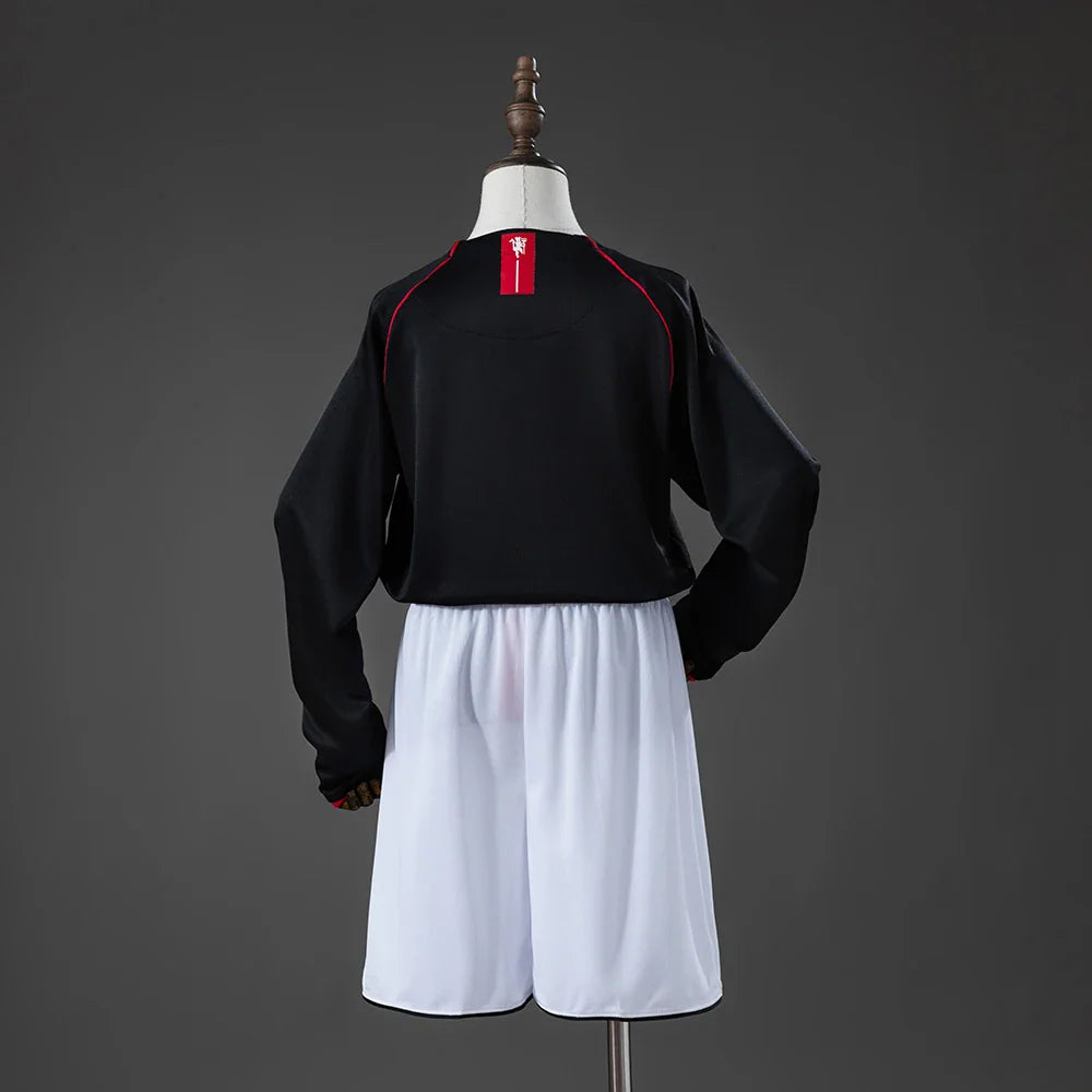 Conjunto retro del Manchester United 07/08 para niños con la espalda lisa - vista trasera