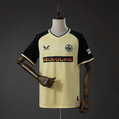 Camiseta del Kaiserslautern tercera equipación 26/27 amarilla con mangas negras - vista frontal