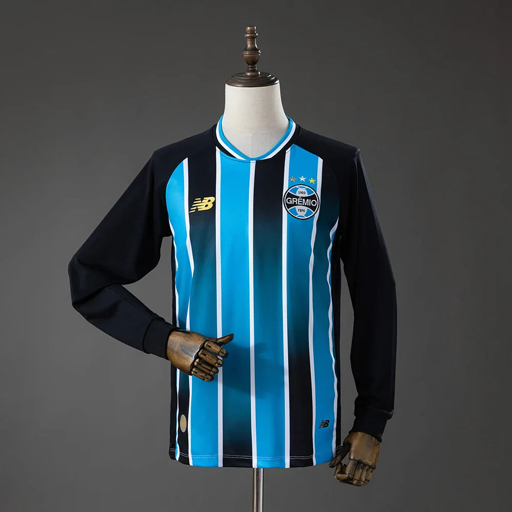 Camiseta Gremio primera equipación 26/27 manga larga a rayas celestes y negras - vista frontal