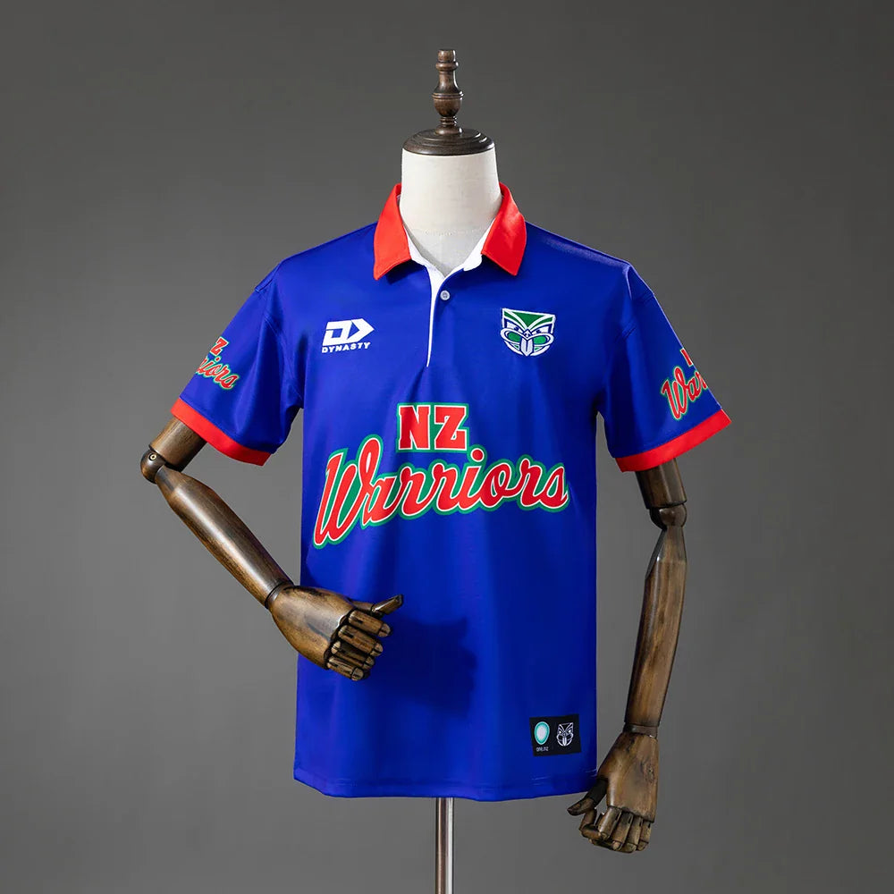 Polo de rugby Nueva Zelanda Warriors 2026 retro azul con cuello rojo - vista frontal