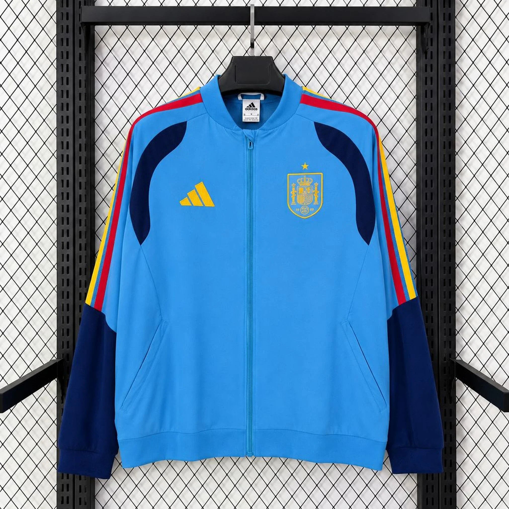 Chaqueta cortavientos España 2026 azul celeste - vista frontal