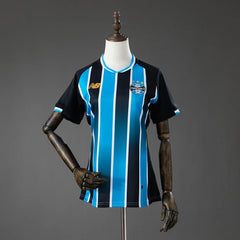 Camiseta de mujer del Gremio 26/27 de rayas celestes y azul marino - vista frontal