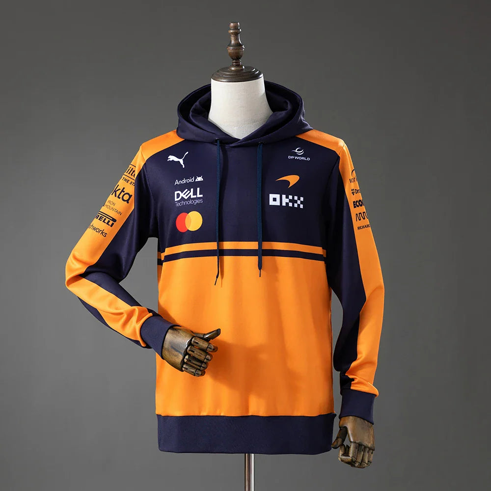 Sudadera con capucha de la escudería McLaren 2026 en naranja y azul marino - vista frontal