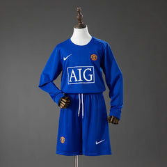 Conjunto retro del Manchester United 08/09 para niños con camiseta azul de manga larga - vista frontal