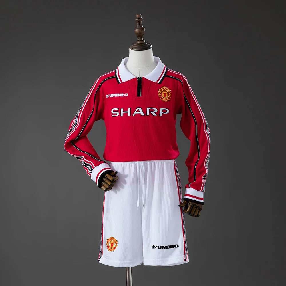 Conjunto retro del Manchester United 98/99 para niños con camiseta roja de manga larga - vista frontal
