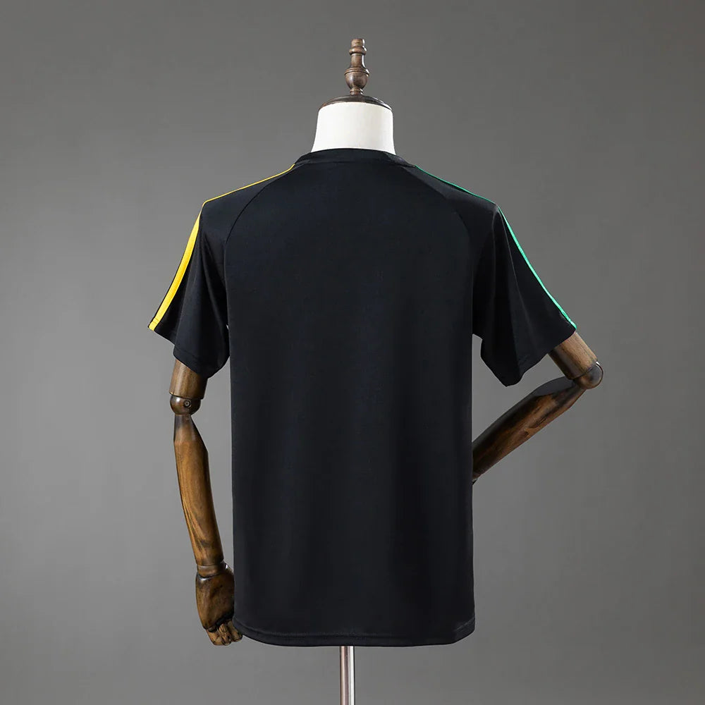 Camiseta de viaje del Celtic 26/27 con la espalda negra lisa - vista trasera
