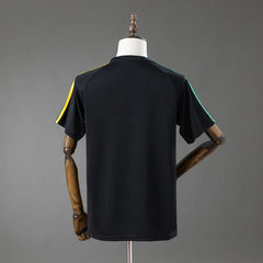 Camiseta de viaje del Celtic 26/27 con la espalda negra lisa - vista trasera