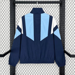 Chaqueta cortavientos de Argentina azul marino y celeste - vista trasera
