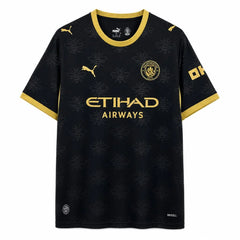 Camiseta Manchester City segunda equipación 26/27 negra y dorada - vista frontal