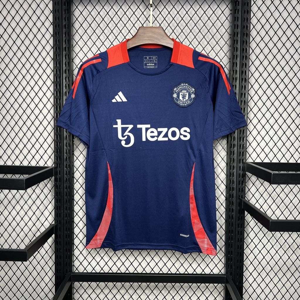 MANCHESTER UNITD ENTRENAMIENTO PREVIO AL PARTIDO AZUL OSCURO 24/25 HOMBRE - Bota de Oro Tienda