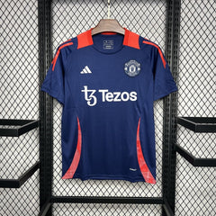 MANCHESTER UNITD ENTRENAMIENTO PREVIO AL PARTIDO AZUL OSCURO 24/25 HOMBRE - Bota de Oro Tienda