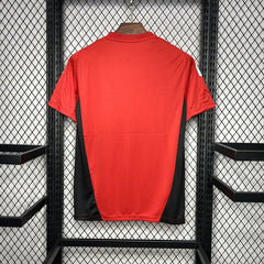 MANCHESTER UNITED CALENTAMIENTO ENTRENAMIENTO ROJA 24/25 HOMBRE - Bota de Oro Tienda