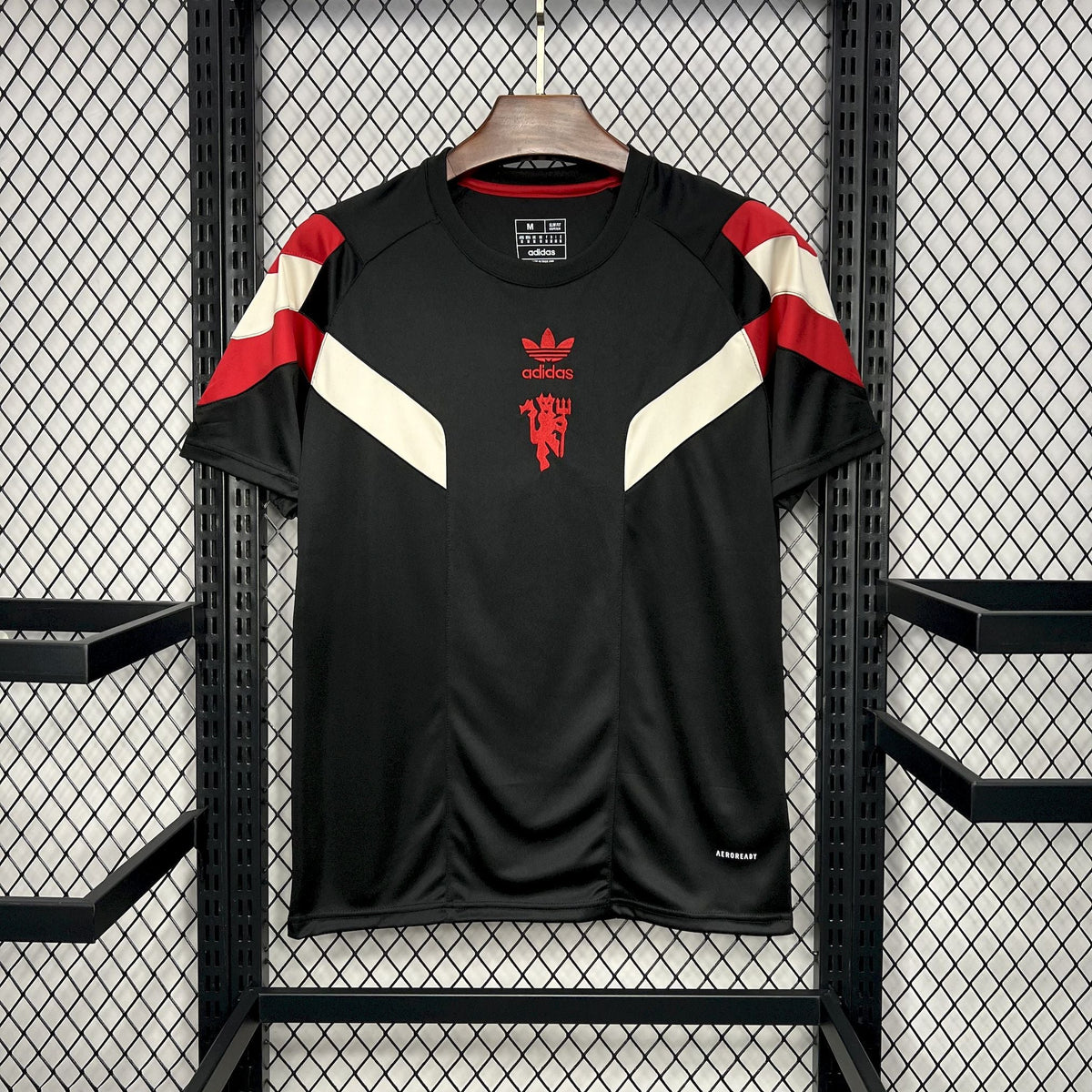 MANCHESTER UNITED ORIGINALES NEGRA 24/25 HOMBRE - Bota de Oro Tienda